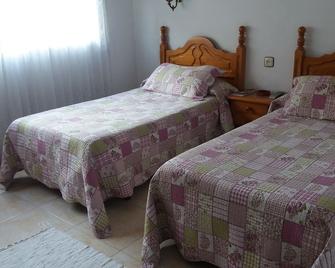 Hotel Covadonga - Benavente - Schlafzimmer