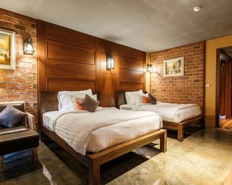 هوتل دي لامور - براخون تشاي - غرفة نوم