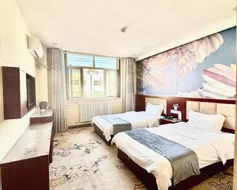 Pai Hotel Chengde Pingquan Central Square - Chengde - Slaapkamer