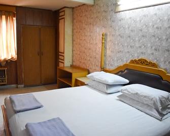 National Hotel - Láhaur - Ložnice