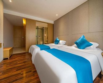 Youcheng Hotel (Guangxi University Metro Station Zoo Branch) - Nanning - Habitación