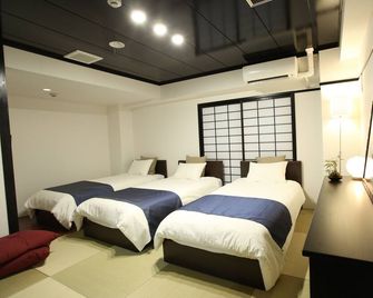Rozy Hotel Namba - אוסקה - חדר שינה