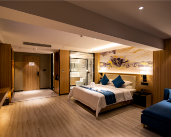 H Hotel - Hanzhong - Slaapkamer