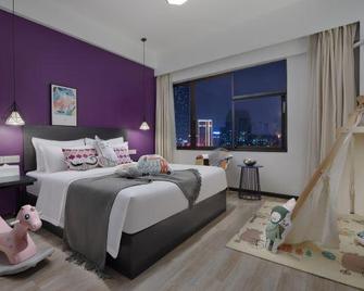 Wonder Land Hotel (Kunming Railway Station) - Kunming - Bedroom