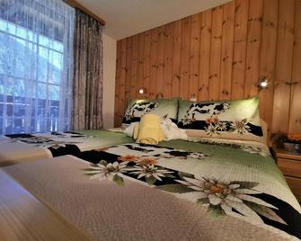 Hotel Walliserhof-Leukerbad-Therme - Leukerbad - Schlafzimmer