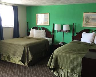 Traveler's Inn Motel - Olney - Schlafzimmer