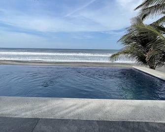 Sunset Rock Costa del Sol modern beach house - San Luis Talpa