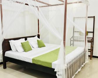 A r a m c o M a d i h a - Matara - Bedroom