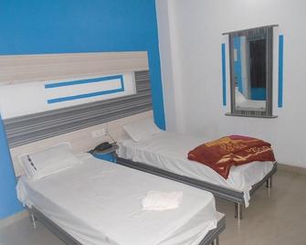 Hotel Radiation - דאוגהאר סאדאר - חדר שינה