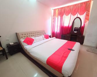 Hotel RJ Inn Kodai - Kodaikanal - Slaapkamer