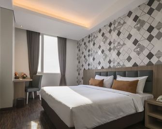 هوتل 88 فاتماواتي جاكار ا ي اي اوتش - جاكرتا - غرفة نوم