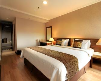 Galeri Ciumbuleuit Family & Business Hotel - Bandung - Bedroom