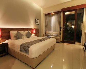 أوما كاران - كوتا - غرفة نوم