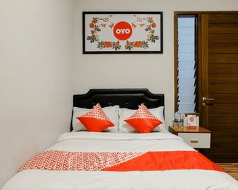 OYO 1023 Junggo Tentrem - Malang - Habitación
