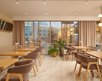 Aura City Hotel - Perm - Restaurante