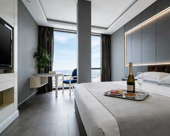 Archos Boutique Hotel - Ankang - Bedroom