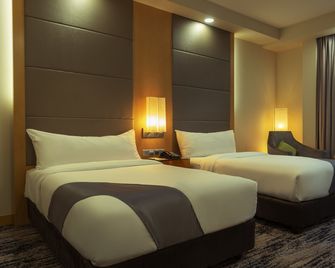 The Waterfront Hotel - קוצ'ינג - חדר שינה