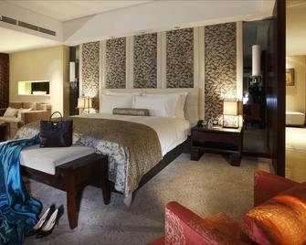 Nanyuan Universe Deluxe Hotel - נינגבו - חדר שינה