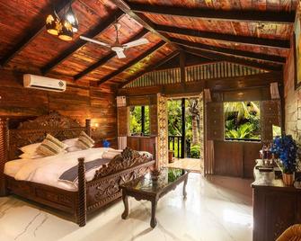 Little Cove Nature Resort - Nashik - Slaapkamer