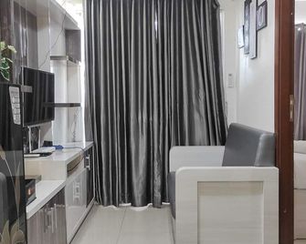 Best Deal and Cozy 2BR Vida View Apartment By Travelio - Makassar