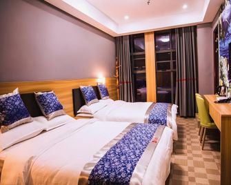 Shell Hotel Jiangxi Fuzhou Linchuan Avenue - Fuzhou - Bedroom