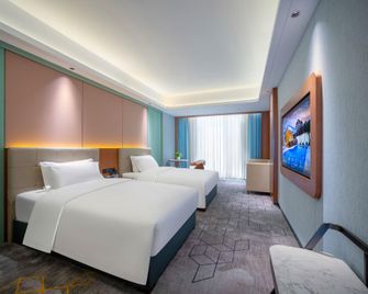 Phoenix International Hotel - Xiangxi - Bedroom