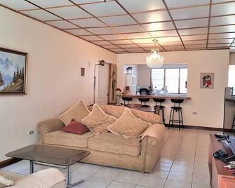 Disfrute y descanso (San José) Casa Sabana Sur - San José - Sala de estar