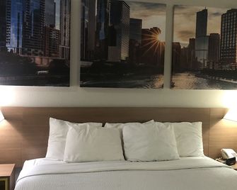 Days Inn & Suites by Wyndham Romeoville - Romeoville - Ložnice