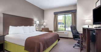 AmericInn by Wyndham Rochester - Rochester - Κρεβατοκάμαρα