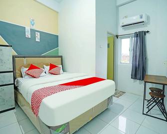 OYO 91559 Kost Bangau Syariah - Prabumulih - Habitación