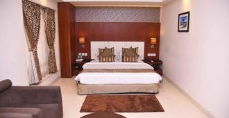 加爾各答切萊斯塔酒店 - 加爾各答 - 加爾各答 - 臥室