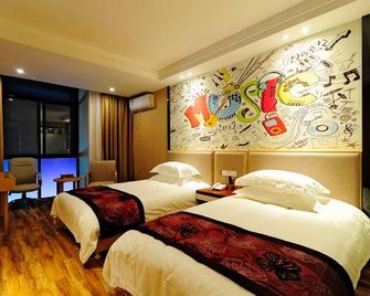 Xingyu Theme Hotel (Huangshan Scenic Area) - Huangshan - Soveværelse