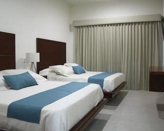 Marena Suites and Apartments - Mazatlán - Schlafzimmer