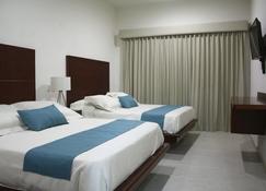 Marena Suites and Apartments - Mazatlán - Schlafzimmer