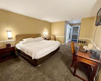 Four Seasons Country Inn - Glasgow - Ložnice
