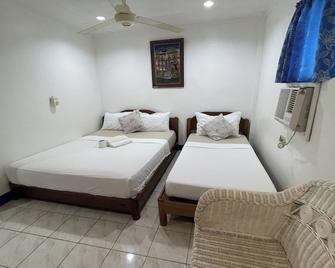 Casa de Praxides Tourist Inn Palawan - Puerto Princesa - Bedroom