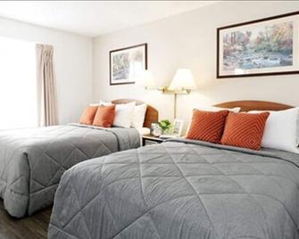 Intown Suites Extended Stay St. Louis Mo - Hazelwood - Hazelwood - Спальня