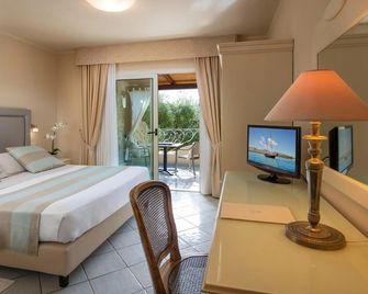Boutique Hotel Su Sergenti - וילאסימיוס - חדר שינה