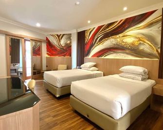 Lombok Raya Hotel - מטראם - חדר שינה