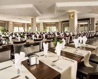 Tusan Beach Resort - קושאדסי - מסעדה