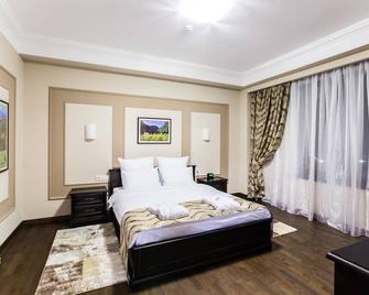 فندق بيست ويسترن بلص أتاكنت بارك - ألماتي - غرفة نوم