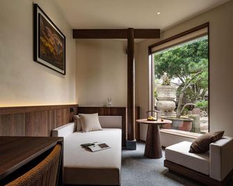 Floral Lux Hotelmount Huangshan Shuxiang Gongyuanli Hotel(Chengkan Store) - Huangshan - Slaapkamer