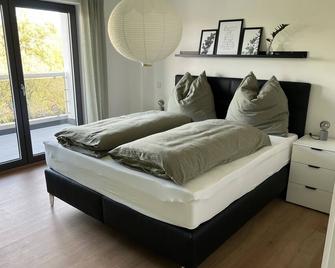 Modern apartment (75sqm) with balcony and terrace in idyllic surroundings - Weissenburg - Habitación