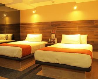 هوتل سانتا كروث - تلالنيبانتلا - غرفة نوم