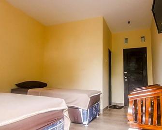 Hotel Cemerlang - Baturaden - Habitación