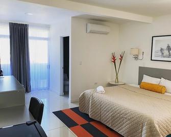 Apartahotel Altos de la Sabana - סן חוזה - חדר שינה