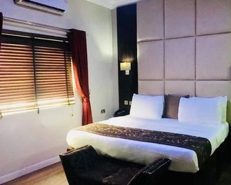De Brit hotel - Benin City - Bedroom
