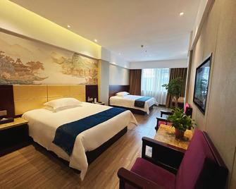 Weidong Garden Hotel - Jingzhou - Bedroom