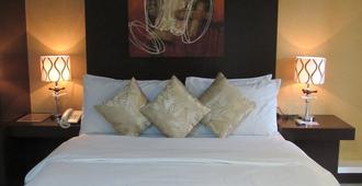 Oyster Plaza Hotel - Las Piñas - Schlafzimmer