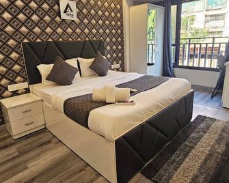 Astha Kandivali Service Apartment - מומבאי - חדר שינה